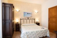 Posteľ alebo postele v izbe v ubytovaní Alba Marina B&B
