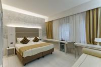 Agape Hotel AA Hotelsにあるベッド