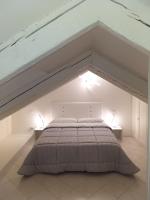 Posteľ alebo postele v izbe v ubytovaní Casanova Apartment San Marco