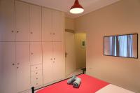 Posteľ alebo postele v izbe v ubytovaní Kleisthenes' apartment
