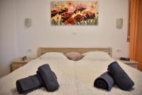 Postel nebo postele na pokoji v ubytování Villa Stella