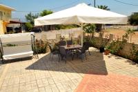 Patio alebo iná vonkajšia časť ubytovania Kasimis