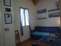 A seating area at Le Case del Sole