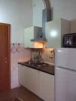 A kitchen or kitchenette at Le Case del Sole