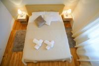 Posteľ alebo postele v izbe v ubytovaní Apartment Nicol