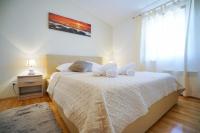 Posteľ alebo postele v izbe v ubytovaní Apartment Nicol
