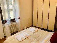 Posteľ alebo postele v izbe v ubytovaní Casa degli Orti, Dolomia best home