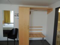 Postel nebo postele na pokoji v ubytování CVJM Düsseldorf Hotel & Tagung