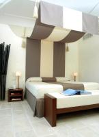 Jumeirah Capri Palaceにあるベッド