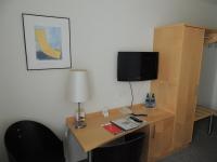TV a/nebo společenská místnost v ubytování CVJM Düsseldorf Hotel & Tagung