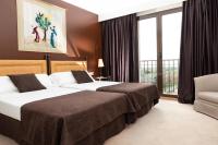 Postel nebo postele na pokoji v ubytování Termes Montbrio Hotel & Spa