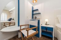 Posteľ alebo postele v izbe v ubytovaní Blue Old Navy Rooms - AE1094