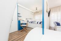 Posteľ alebo postele v izbe v ubytovaní Blue Old Navy Rooms - AE1094