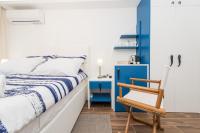 Posteľ alebo postele v izbe v ubytovaní Blue Old Navy Rooms - AE1094