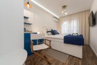Posteľ alebo postele v izbe v ubytovaní Blue Old Navy Rooms - AE1094