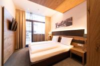 Posteľ alebo postele v izbe v ubytovaní Hotel Rundeck