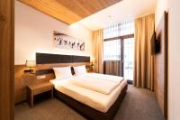Posteľ alebo postele v izbe v ubytovaní Hotel Rundeck