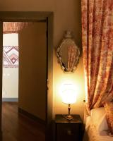 A bed or beds in a room at Capri Moon Guest House