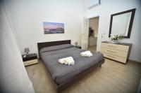 Posteľ alebo postele v izbe v ubytovaní Casa Sarina