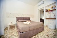 Posteľ alebo postele v izbe v ubytovaní Casa Sarina