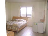 Postel nebo postele na pokoji v ubytování TK Guesthouse