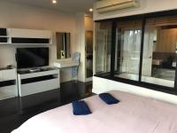 Postel nebo postele na pokoji v ubytování WOW Apartment at Unity Patong