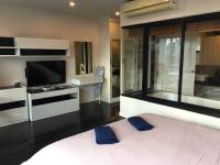 Postel nebo postele na pokoji v ubytování WOW Apartment at Unity Patong