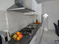 Kuchyň nebo kuchyňský kout v ubytování Apartment Mariana