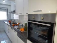 Kuchyň nebo kuchyňský kout v ubytování Apartment Mariana