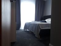 Posteľ alebo postele v izbe v ubytovaní Apartament Stara Gazownia