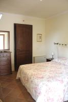 Posteľ alebo postele v izbe v ubytovaní Residenza Porta Guelfa