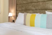 Posteľ alebo postele v izbe v ubytovaní Seven Heaven Premium Suites