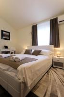 Posteľ alebo postele v izbe v ubytovaní Bellevue Hill apartment