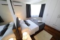 Posteľ alebo postele v izbe v ubytovaní Bellevue Hill apartment