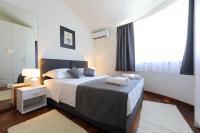 Posteľ alebo postele v izbe v ubytovaní Bellevue Hill apartment