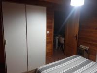 Łóżko lub łóżka w pokoju w obiekcie Cabañas El Nogueral