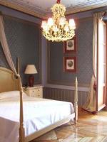 Cama o camas de una habitación en Posada Real Los Cinco Linajes