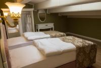 A bed or beds in a room at Yildiz Life Hotel