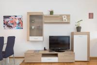 Televízia a/alebo spoločenská miestnosť v ubytovaní Cute and Sunny Studio in Zagreb with Balcony & Free Parking