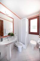 A bathroom at Kelly Apartments Cefalù