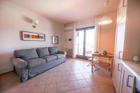 A seating area at Kelly Apartments Cefalù