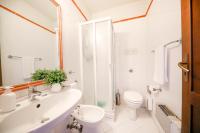 A bathroom at Kelly Apartments Cefalù