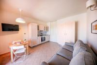 A kitchen or kitchenette at Kelly Apartments Cefalù