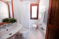 A bathroom at Kelly Apartments Cefalù