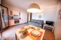 A kitchen or kitchenette at Kelly Apartments Cefalù