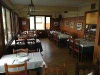 Reštaurácia alebo iné gastronomické zariadenie v ubytovaní hotel la trainera