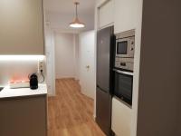 Kuchnia lub aneks kuchenny w obiekcie ARENA Apartamento - Perla Boutique Apartamentos