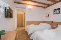Posteľ alebo postele v izbe v ubytovaní Rooms Kala
