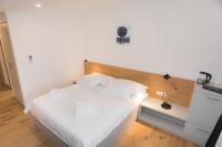 Posteľ alebo postele v izbe v ubytovaní Rooms Kala