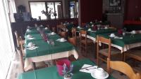 Reštaurácia alebo iné gastronomické zariadenie v ubytovaní Hotel Primavera